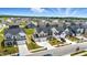 Aerial view of a neighborhood showcasing multiple homes and green spaces at 7301 Deerberg Dr, Indianapolis, IN 46259