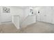 Bright hallway featuring a carpeted floor and white walls at 7301 Deerberg Dr, Indianapolis, IN 46259