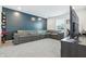 Spacious living room featuring a large sectional couch, tv and lots of seating at 7301 Deerberg Dr, Indianapolis, IN 46259