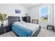 Comfortable Main bedroom featuring a queen size bed and natural light at 7301 Deerberg Dr, Indianapolis, IN 46259