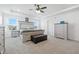 Spacious main bedroom with carpet, tray ceiling, bench, and a dresser at 7301 Deerberg Dr, Indianapolis, IN 46259