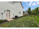 Well-maintained backyard with a wooden fence, lush lawn, and manicured flower beds at 8835 Harrison Pkwy, Fishers, IN 46038
