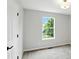 Bedroom featuring a window with a view of the outdoors and neutral carpet flooring at 8835 Harrison Pkwy, Fishers, IN 46038