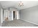 Spacious bedroom with neutral walls, plush carpeting, and ensuite bathroom at 8835 Harrison Pkwy, Fishers, IN 46038