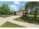 Lovely two-story home with attached garage, manicured lawn, and charming landscaping at 8835 Harrison Pkwy, Fishers, IN 46038