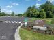 Inviting entrance to Harrison Thompson Park with manicured landscaping and clear signage for the community at 8835 Harrison Pkwy, Fishers, IN 46038