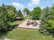 Community playground featuring modern play structures and a covered gazebo offers a fun recreational space at 8835 Harrison Pkwy, Fishers, IN 46038