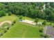 Aerial view of a playground with swings and slides next to a baseball field at 8835 Harrison Pkwy, Fishers, IN 46038