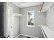 Walk-in closet with rod and shelf storage and a window for natural light at 8835 Harrison Pkwy, Fishers, IN 46038