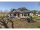 Beautiful backyard with a covered patio, offering great space for outdoor gatherings and enjoyment at 886 J Mccool Way, Greenwood, IN 46142