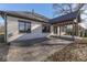 Spacious outdoor patio and covered porch, perfect for relaxation and entertaining, with nice architectural details at 886 J Mccool Way, Greenwood, IN 46142