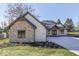 Stunning exterior featuring stone and white painted brick and a well-manicured lawn at 886 J Mccool Way, Greenwood, IN 46142