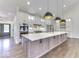 Beautiful kitchen with a center island, stainless steel appliances, and stylish pendant lighting at 886 J Mccool Way, Greenwood, IN 46142