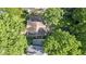 Bird's-eye view of home featuring spacious backyard with mature trees, patio area, and privacy at 111 N 8Th St, Zionsville, IN 46077