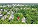 Charming home nestled in a lush, green neighborhood, with mature trees and close to city amenities at 111 N 8Th St, Zionsville, IN 46077