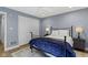 Bedroom features a bed, nightstands, and a closet at 111 N 8Th St, Zionsville, IN 46077