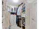 Organized walk-in closet with shelving, drawers, and hanging space for optimal storage at 111 N 8Th St, Zionsville, IN 46077