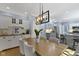 Dining room with seating for four, overhead lighting and an open concept to kitchen at 111 N 8Th St, Zionsville, IN 46077