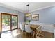 Cozy dining area includes sliding glass doors leading to the exterior deck at 111 N 8Th St, Zionsville, IN 46077