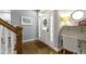Inviting foyer with hardwood floors and a charming desk and chair at 111 N 8Th St, Zionsville, IN 46077