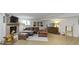 Basement living room showcases a brick fireplace and comfortable seating at 111 N 8Th St, Zionsville, IN 46077