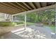 Lower level patio features pavers, a stone-lined garden bed, and a play area for outdoor enjoyment at 111 N 8Th St, Zionsville, IN 46077