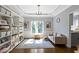 Bright playroom featuring a large window and a well-organized shelving unit at 111 N 8Th St, Zionsville, IN 46077