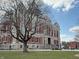 Historic building featuring brick exterior, detailed architecture, and well-maintained grounds at 1114 Winterfield Blvd, Franklin, IN 46131