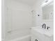 Freshly remodeled bathroom features a soaking tub, new fixtures, and ample storage at 11230 N College Ave, Carmel, IN 46032