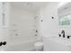 Freshly remodeled bathroom features a soaking tub, new fixtures, and ample storage at 11230 N College Ave, Carmel, IN 46032
