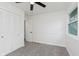 Bedroom with a closet, and plush gray carpet at 11230 N College Ave, Carmel, IN 46032