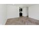 Bright living room featuring herringbone floors and neutral walls at 11230 N College Ave, Carmel, IN 46032