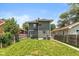 Backyard with a green lawn and a wooden fence at 1141 W 35Th St, Indianapolis, IN 46208