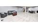 Finished basement area with seating, carpet flooring, and staircase to the main level at 11626 Laurel Springs Cir, Noblesville, IN 46060