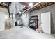 Unfinished basement with exposed ceiling, concrete floor, and essential utility installations at 11626 Laurel Springs Cir, Noblesville, IN 46060