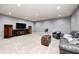 Finished basement features neutral carpet, recessed lighting, and ample space for recreation at 11626 Laurel Springs Cir, Noblesville, IN 46060