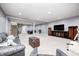 Spacious finished basement features neutral carpet, recessed lighting, and ample space for recreation at 11626 Laurel Springs Cir, Noblesville, IN 46060