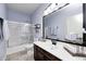 Well-lit bathroom featuring modern fixtures, a spacious vanity, and a shower and tub combo at 11626 Laurel Springs Cir, Noblesville, IN 46060