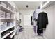 Walk-in closet with custom shelving and storage solutions, offering ample space for organization at 11626 Laurel Springs Cir, Noblesville, IN 46060