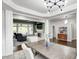 Formal dining room with hardwood floors and an abundance of natural light at 11626 Laurel Springs Cir, Noblesville, IN 46060