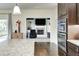 Granite countertops and stainless steel appliances, located next to living room at 11626 Laurel Springs Cir, Noblesville, IN 46060