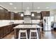 Stylish kitchen with granite countertops, stainless steel appliances, and a central island at 11626 Laurel Springs Cir, Noblesville, IN 46060