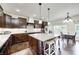 Large kitchen island with bar seating and stainless steel appliances, perfect for entertaining at 11626 Laurel Springs Cir, Noblesville, IN 46060