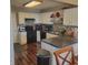 Bright kitchen with modern cabinets, sleek countertops, and black appliances at 11985 Cat Tail Ct, Noblesville, IN 46060