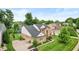 Aerial view of a beautiful home showcasing its well-manicured lawn and three car garage at 11995 Gray Eagle Dr, Fishers, IN 46037