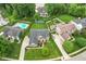 Spacious property with a large pool and a manicured backyard surrounded by lush greenery at 11995 Gray Eagle Dr, Fishers, IN 46037