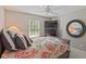 Cozy bedroom with a large window and a dark wood dresser at 11995 Gray Eagle Dr, Fishers, IN 46037