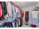 Walk-in closet with ample storage and organization solutions for clothing at 11995 Gray Eagle Dr, Fishers, IN 46037