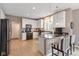 Well-lit kitchen featuring granite countertops, stainless steel appliances and breakfast bar with seating at 11995 Gray Eagle Dr, Fishers, IN 46037
