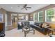 Comfortable living room with many windows for natural light with easy access to kitchen at 11995 Gray Eagle Dr, Fishers, IN 46037